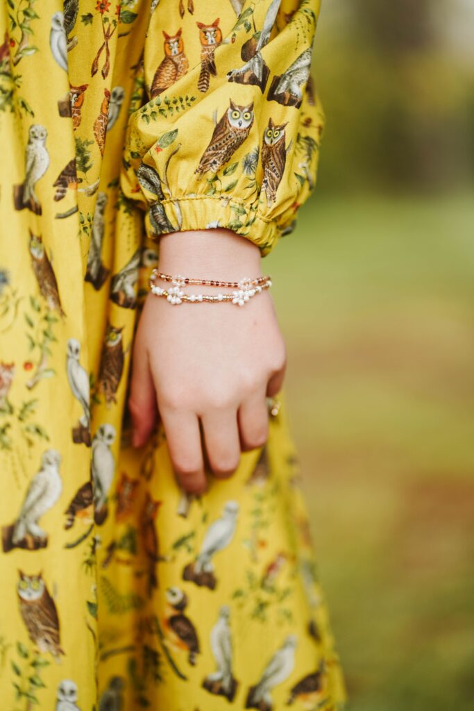 Guiding Light: The Symbolism Behind The Alex And Ani Godmother Bracelet